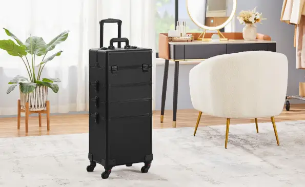 Black rolling luggage case in stylish living room with velvet armchair and makeup table