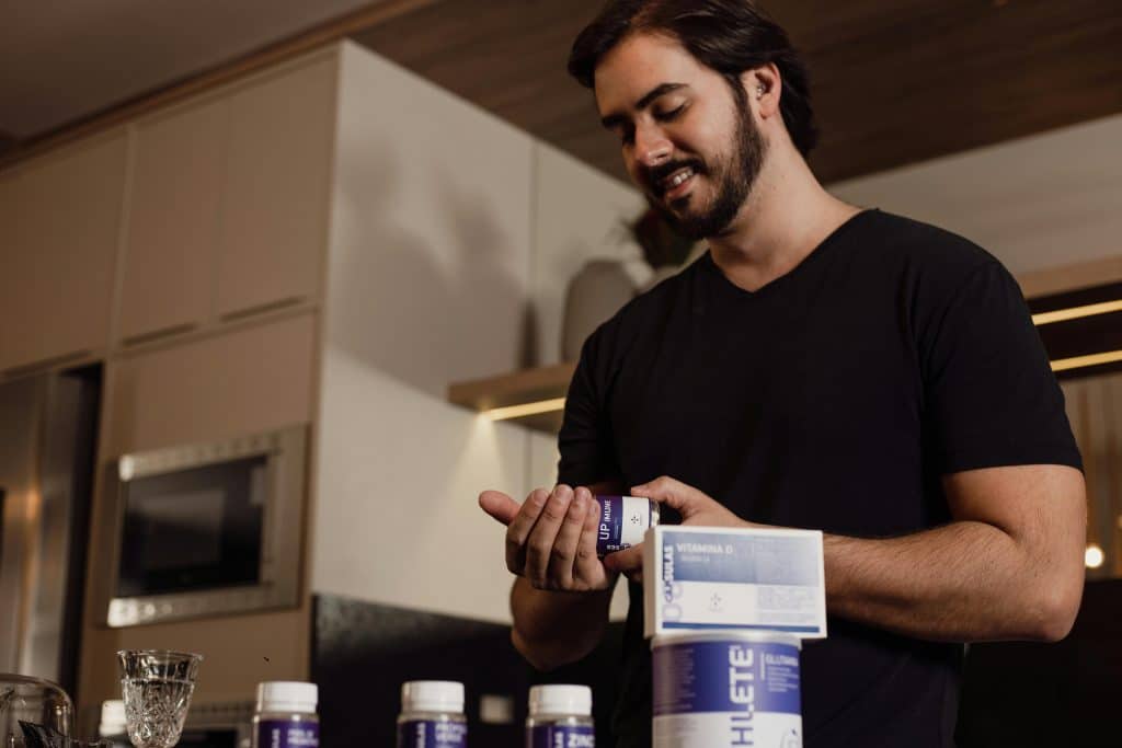 Human taking supplements