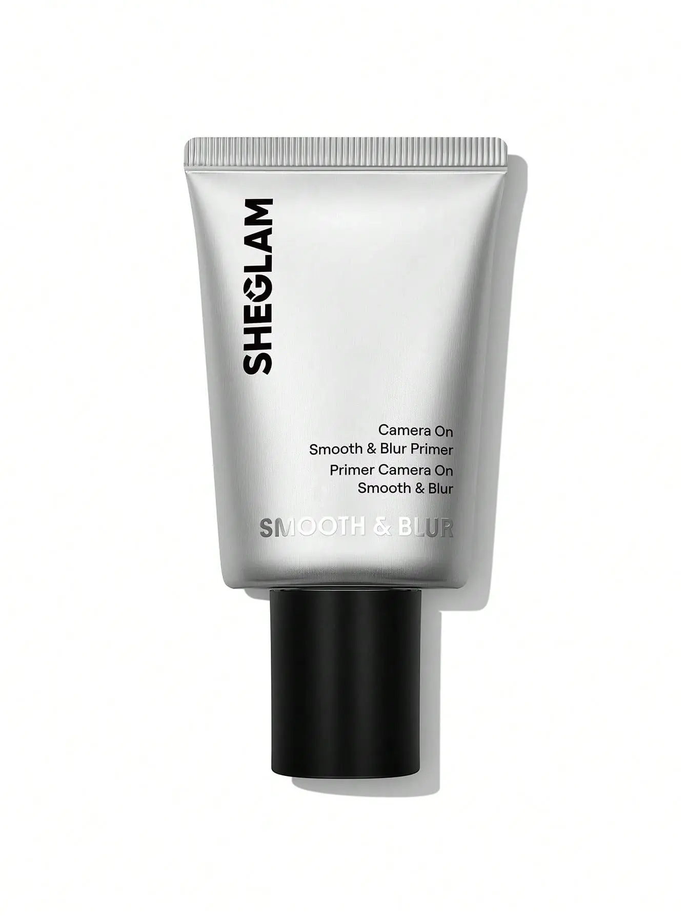 Silver tube of SHEGLAM Smooth & Blur Primer with black cap on white background