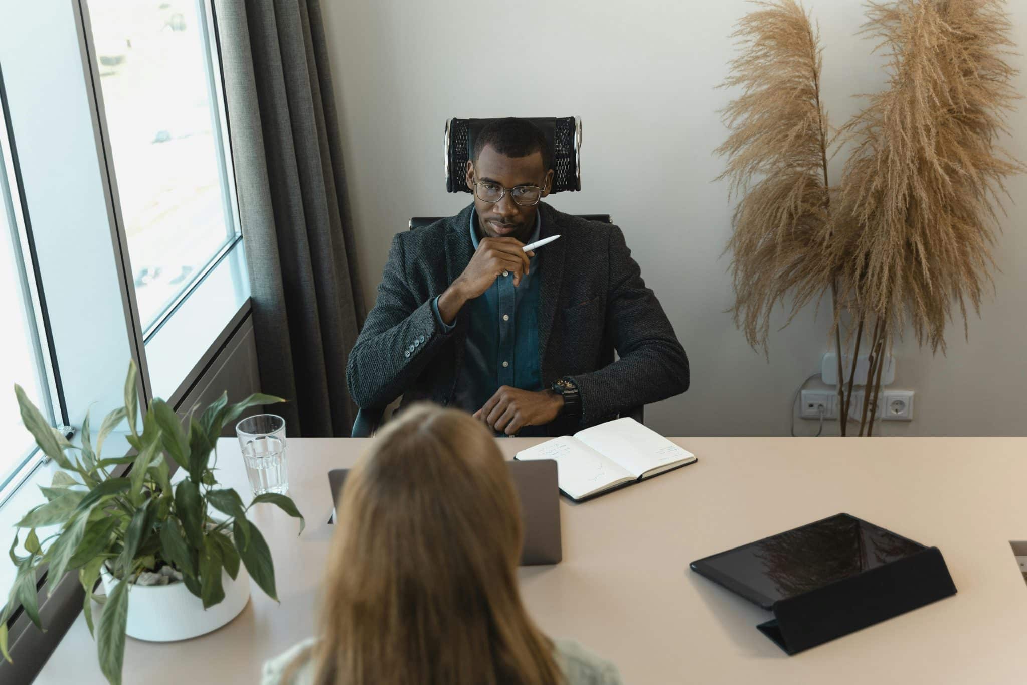 In an ideal hiring process, candidates would be evaluated only on skills, experience, judgment, performance history, and their ability to contribute to a company’s goals. In reality, hiring decisions are made by humans, and humans are influenced by first impressions. Appearance, grooming, clothing, posture, facial expression, and overall presentation can all shape how a candidate is perceived before the first interview question is even answered. This does not mean that recruiters intentionally choose attractive candidates over qualified ones. More often, the influence is subtle. A polished appearance may be interpreted as confidence, discipline, professionalism, or social intelligence. A less conventional appearance may be unfairly read as a lack of preparation or seriousness. These assumptions can be especially important in high-paying roles, where employers are often evaluating not only technical ability but also leadership presence, client-facing communication, and cultural fit. The problem is that appearance is a weak and risky shortcut. It may affect perception, but it does not reliably predict performance. A well-dressed candidate may still lack the skills to succeed, while a highly capable candidate may be overlooked because they do not match an interviewer’s unconscious image of what an executive, consultant, manager, or senior specialist should look like. The Beauty Premium and the Halo Effect Researchers have studied the relationship between physical attractiveness and labor market outcomes for decades. Many studies point to a so-called beauty premium, where people perceived as more attractive may receive more favorable evaluations, higher wages, or better career opportunities. The effect is not universal, and it varies by industry, role, gender, and culture, but the general pattern is clear enough to matter. One reason this happens is the halo effect. When a person makes a positive first impression in one area, observers may unconsciously assume they also have other positive traits. In hiring, this can mean that a candidate who appears confident, stylish, or physically attractive may be judged as more competent, persuasive, or capable than the evidence actually shows. High-paying jobs can amplify this bias because they often involve subjective judgments. Employers may be looking for executive presence, leadership potential, or the ability to represent a company in important meetings. These are real business concerns, but they can easily become vague categories that allow bias to enter the decision-making process. Professional Presentation vs. Appearance Bias It is important to separate professional presentation from appearance bias. Employers can reasonably expect candidates to appear prepared for an interview. Clean grooming, appropriate clothing, punctuality, and respectful communication all signal that the candidate understands the context of the meeting.But professional presentation is not the same as beauty, age, body type, hairstyle, accent, or personal style. A fair hiring process should not reward candidates simply because they fit a narrow or traditional image of success. It should focus on whether the person can perform the job, collaborate with others, solve problems, and meet business goals. For candidates, the practical lesson is not to obsess over appearance. It is to manage the controllable parts of first impressions. Dressing appropriately for the industry, preparing clear examples of past achievements, maintaining confident body language, and communicating with structure can help reduce the chance that superficial judgments dominate the interview. Why Recruiters and Employers Need Structure For employers, the bigger responsibility is to design hiring systems that reduce the influence of appearance-based assumptions. Unstructured interviews are especially vulnerable to bias because each candidate may be asked different questions and judged against unclear standards. When the process is informal, personal impressions can carry too much weight. Structured interviews create more consistency. Each candidate is evaluated using the same core criteria, the same job-related questions, and a defined scoring system. This does not remove human judgment, but it gives recruiters and hiring managers a better framework for comparing candidates fairly. Skills-based assessments can also help. Work samples, case studies, role-specific exercises, and practical tests give employers evidence of ability. For high-paying roles, this can be particularly valuable because confidence and presentation can sometimes mask weak execution. A candidate who speaks well in an interview should still be able to demonstrate strategic thinking, technical skill, or leadership judgment. Many companies also benefit from outside recruiting expertise. Experienced staffing agencies can help employers define role requirements, screen candidates more consistently, and keep the hiring process focused on qualifications rather than subjective impressions. The Risk of Confusing Confidence With Competence High-paying jobs often attract candidates who are skilled at presenting themselves. They may know how to speak with authority, dress for the room, and control the tone of an interview. These are useful professional skills, but they should not be mistaken for competence. A strong hiring process looks beyond confidence. It asks what the candidate has actually achieved, how they made decisions, how they handled failure, and what measurable impact they created. It also checks references carefully and compares interview performance with real evidence. This is especially important in leadership hiring. A leader’s appearance or charisma may make a strong first impression, but long-term success depends on judgment, ethics, communication, resilience, and the ability to build trust. Companies that hire for image over substance may pay a high price through poor decisions, employee turnover, and cultural damage. Creating a Fairer Hiring Culture Reducing appearance bias does not require ignoring first impressions altogether. It requires putting them in the right place. First impressions may tell an interviewer something about communication style or preparation, but they should not become the foundation of a hiring decision. Employers can improve fairness by training interviewers on common biases, using diverse hiring panels, documenting candidate evaluations, and agreeing on success criteria before interviews begin. Candidates should be compared against the role, not against each other’s personal style. Companies should also be careful with phrases like culture fit. When used well, culture fit means alignment with values, expectations, work style, and team needs. When used poorly, it can become a polite way to prefer people who look, speak, or present themselves in familiar ways. A better approach is culture contribution. Instead of asking whether a candidate looks like the existing team, employers can ask what strengths, experiences, and perspectives the person may add. Conclusion Appearance can influence hiring decisions, including decisions for high-paying jobs, because people naturally form impressions quickly. But the fact that appearance bias exists does not make it useful or fair. For candidates, professional presentation can help create a positive first impression. For employers, the real goal should be to prevent first impressions from overpowering evidence. The best hiring decisions come from structured evaluation, clear criteria, skills-based screening, and a disciplined focus on job performance. In a competitive labor market, companies cannot afford to let superficial bias shape important hiring choices. The strongest teams are built when employers look past assumptions and identify the people most capable of doing the work.