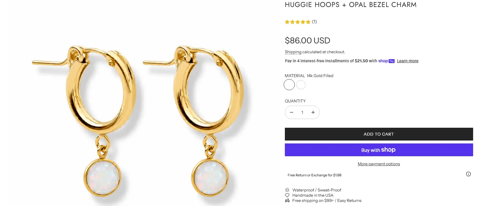Gold hoop earrings with dangling opal bezel charms on white background