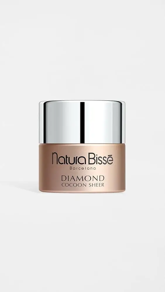 Natura Bissé Diamond Cocoon Sheer cream jar with silver lid against white background