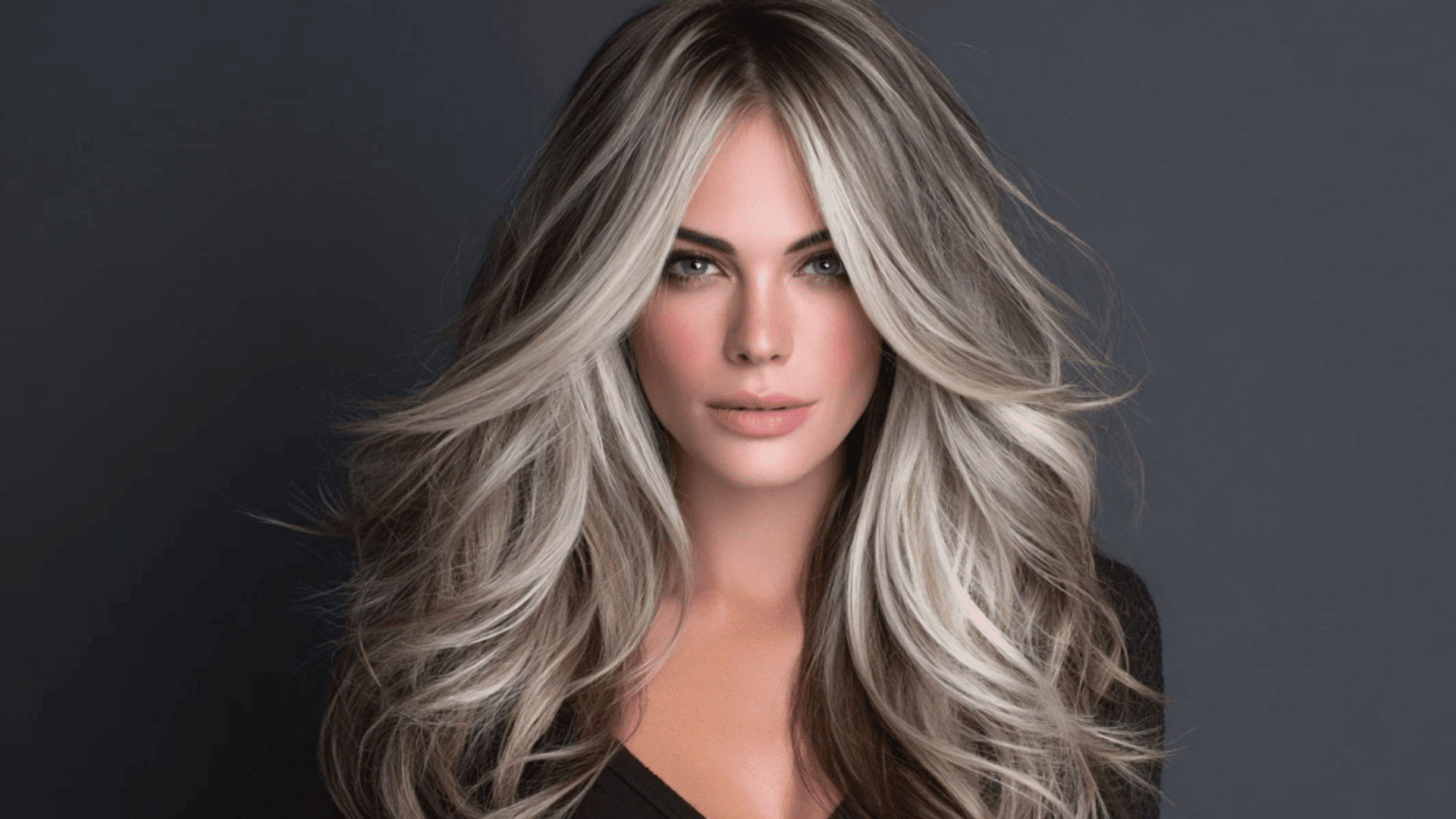 Ash brown money piece highlights framing the face on long hair