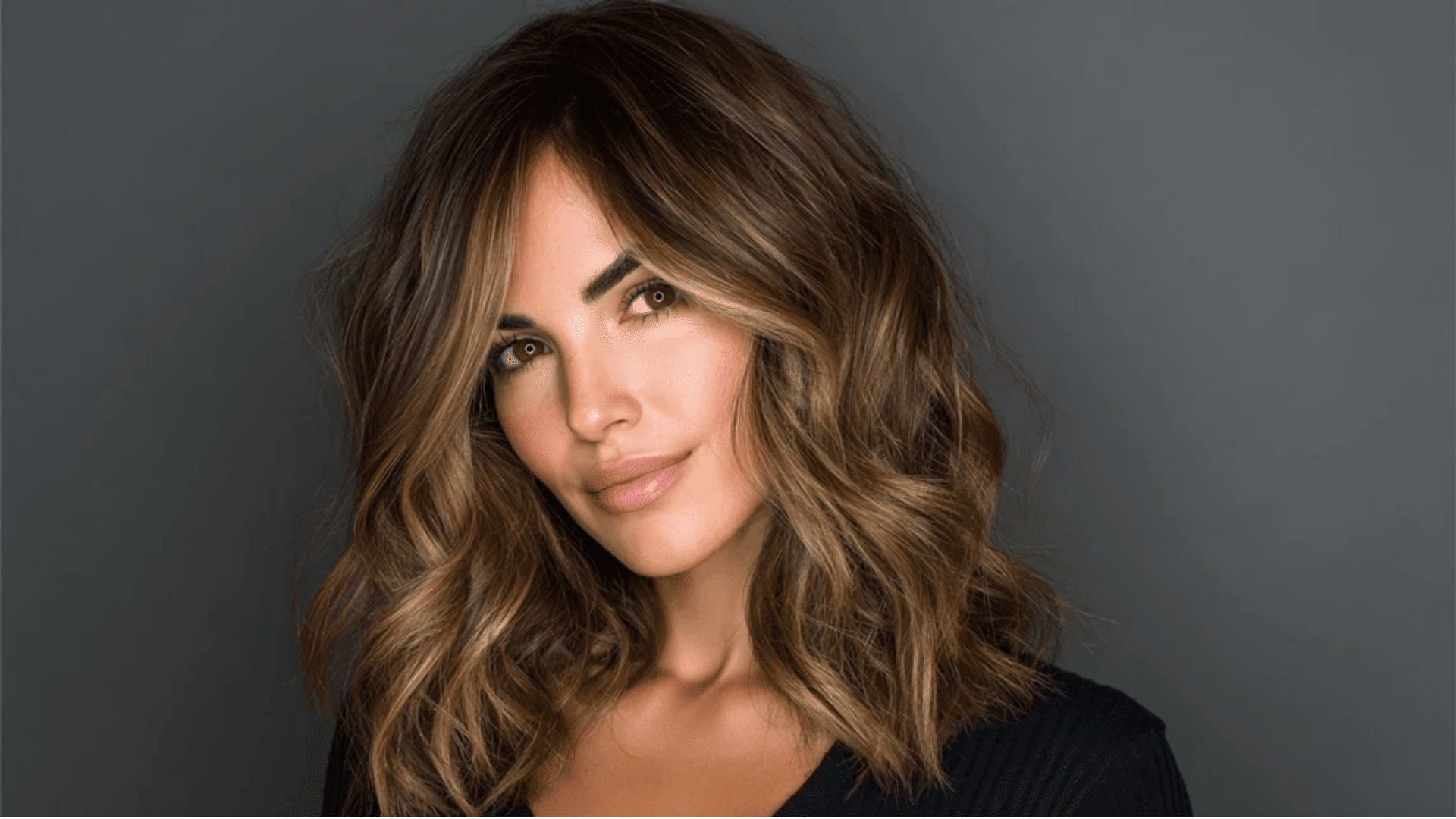 Ashy caramel balayage combining cool ash tones with warm undertones