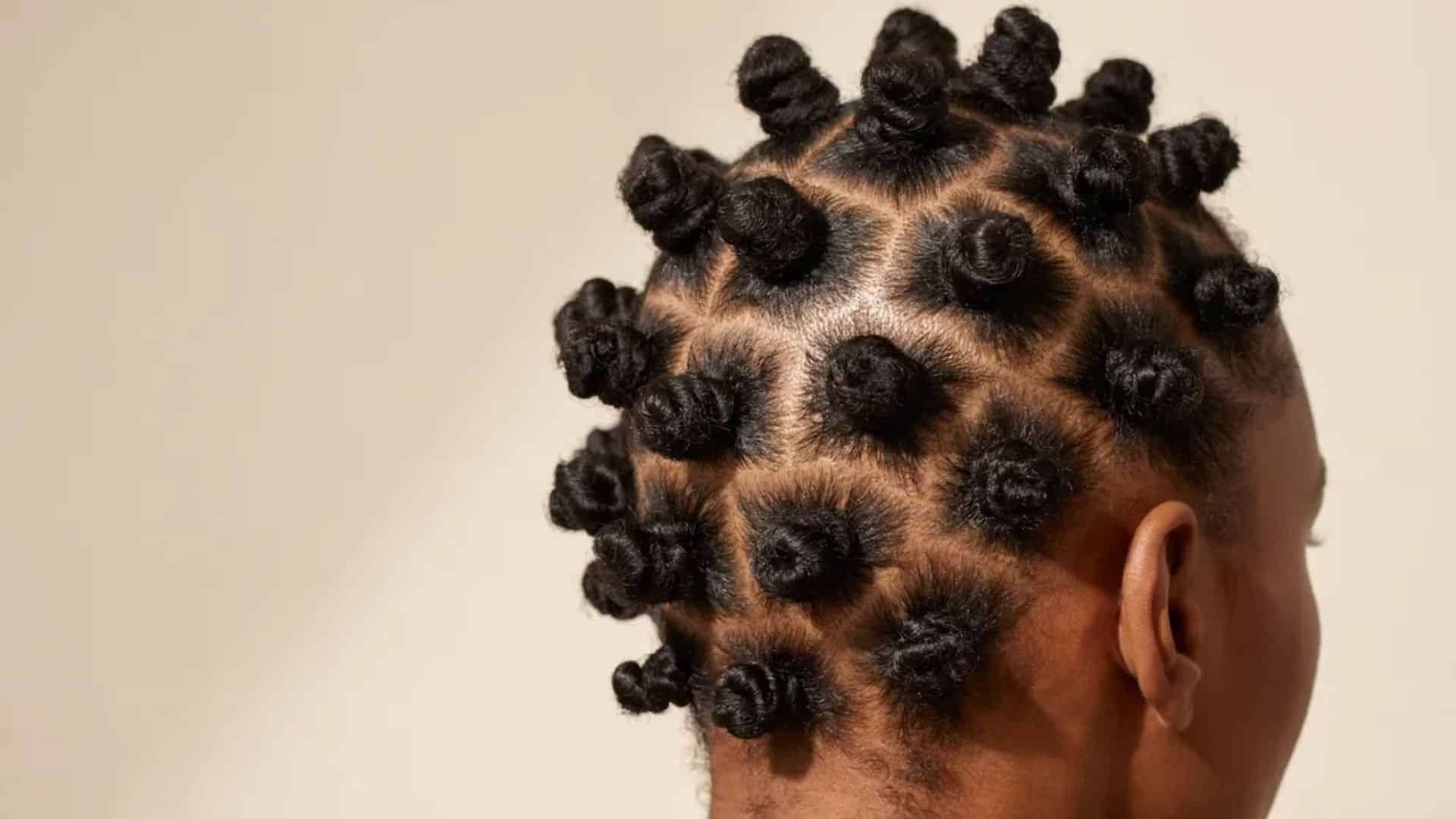 Multiple bantu knots styled across the scalp showcasing a classic protective hairstyle