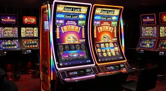 Slot machines with vibrant illuminated screens in a dimly lit casino setting