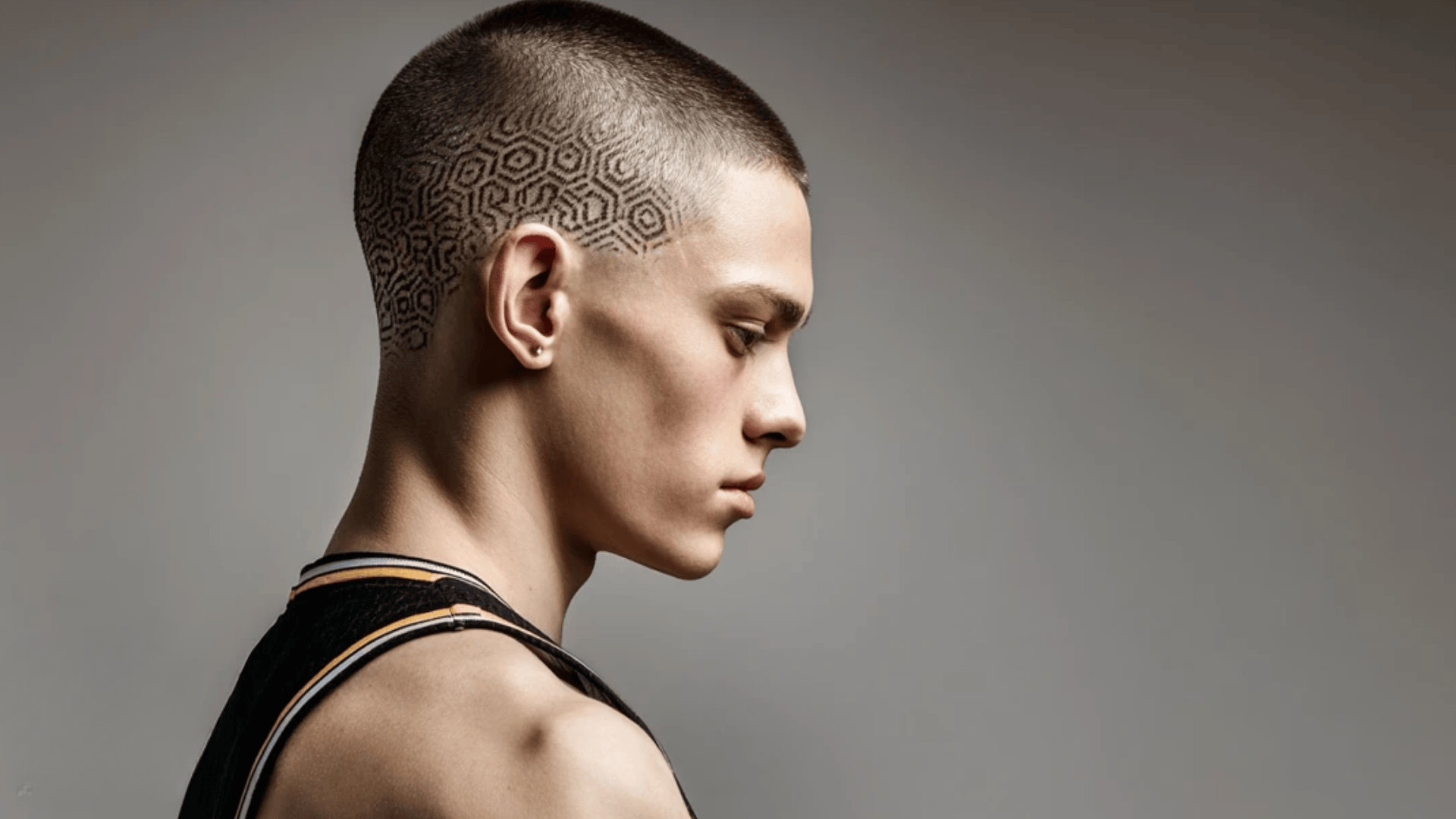 Buzz cut with creative line design for teens