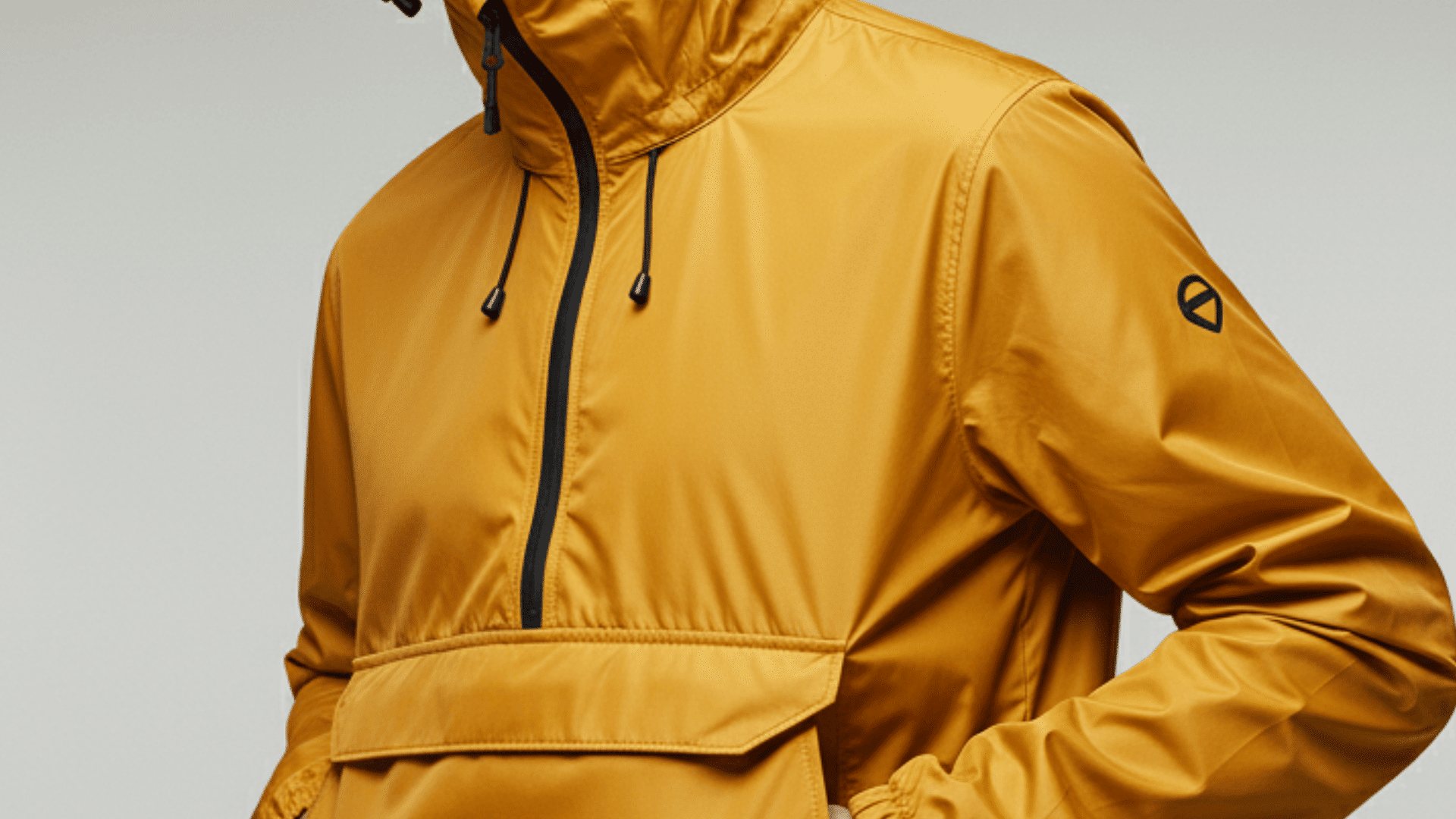 Lightweight waterproof cagoule jacket that folds compactly for travel and hiking