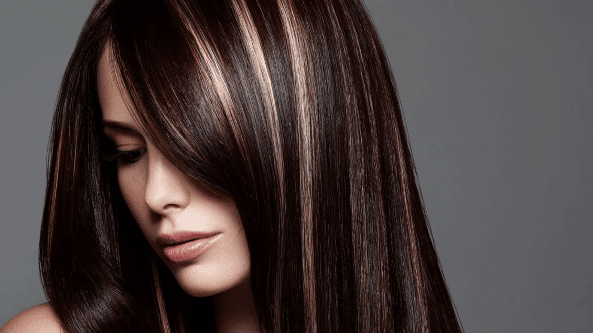 Bold chunky ash brown ribbon highlights on straight hair