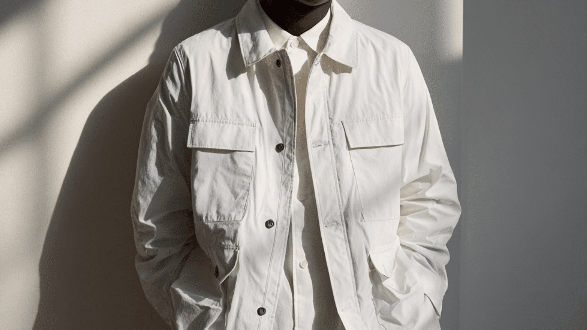 Lightweight coach jacket with snap buttons and minimalist streetwear inspired style