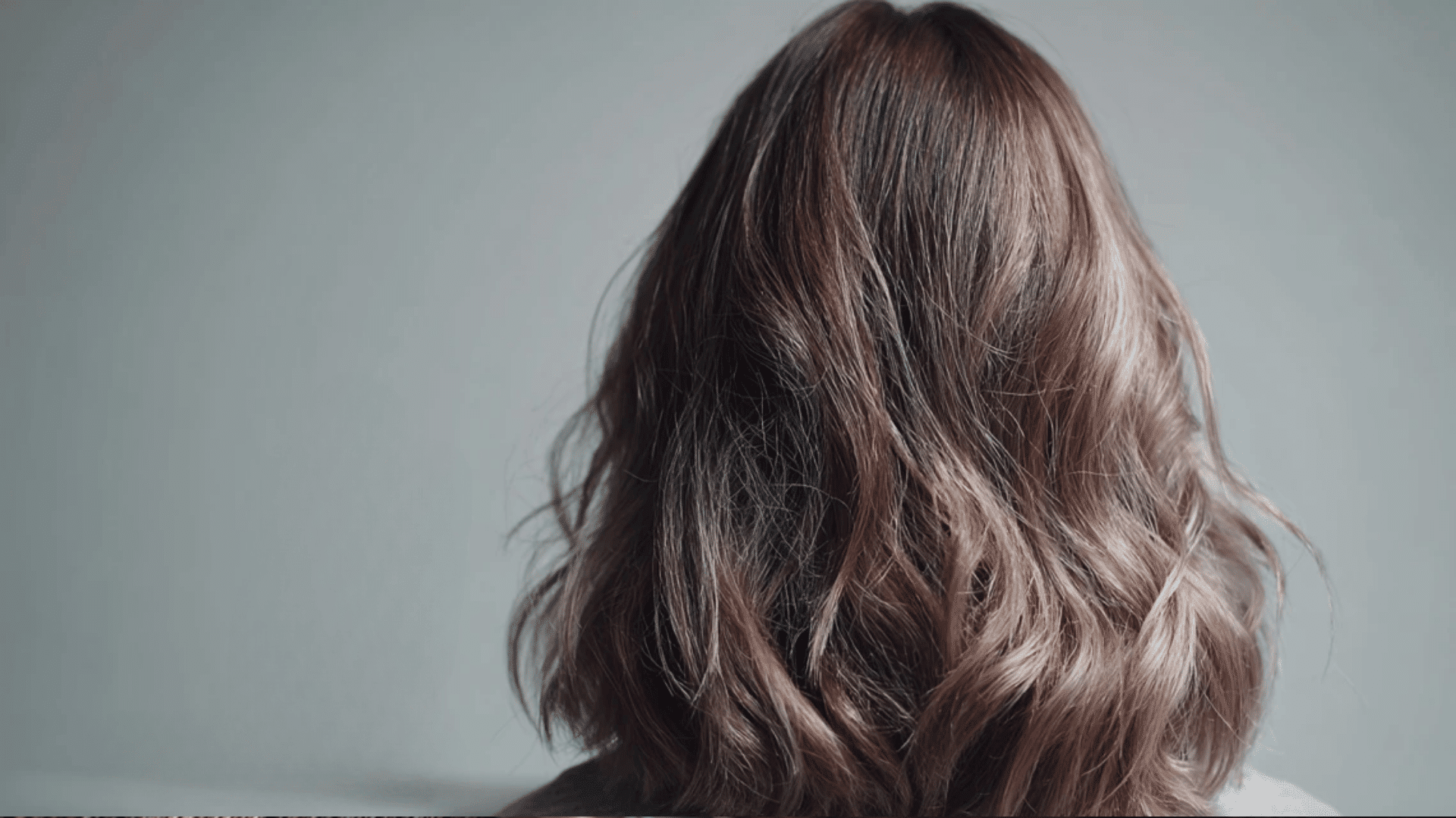 Brown hair showing common hair toner mistakes including uneven tone and lack of shine