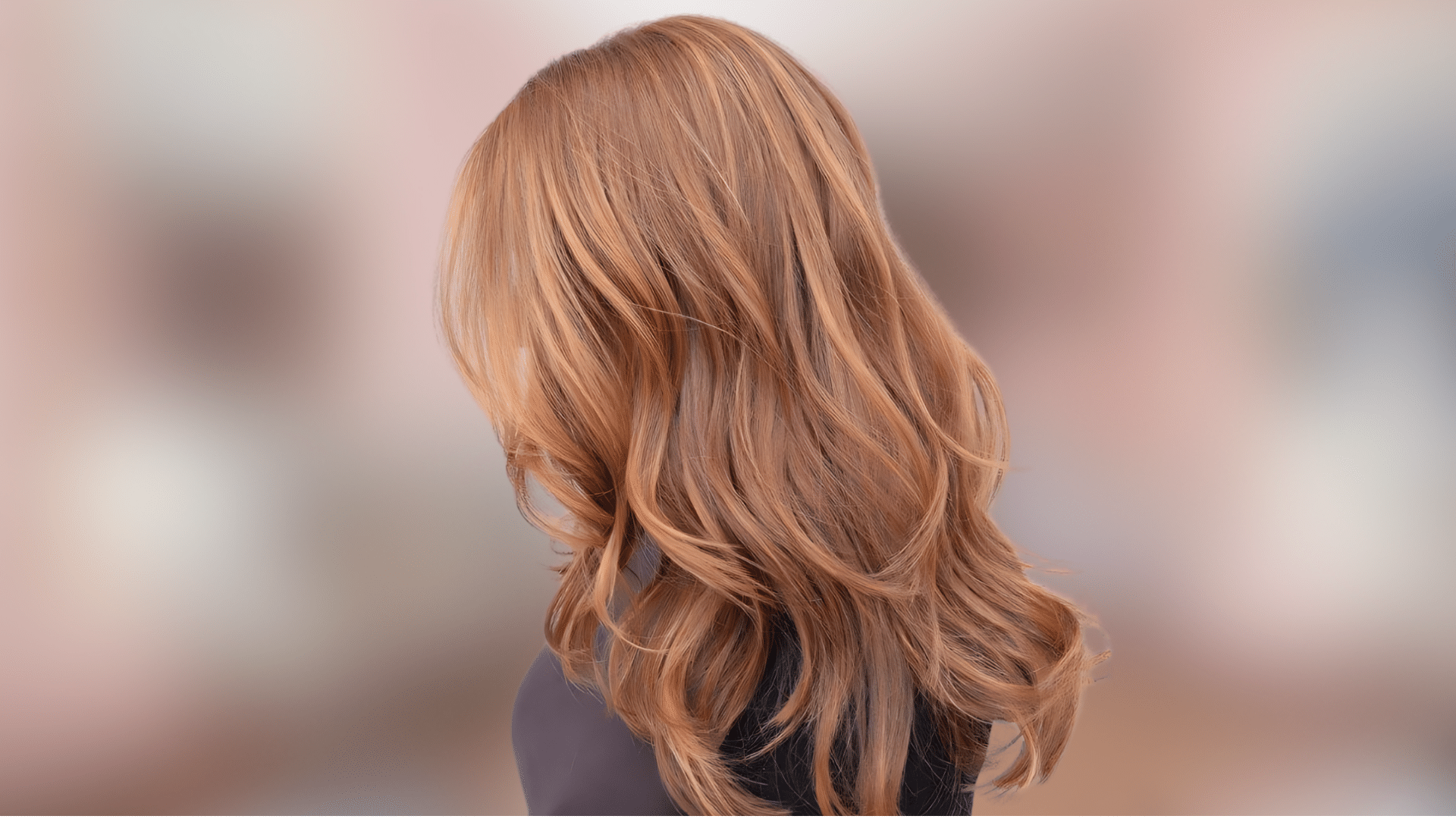 Shoulder length waves displaying copper brown hair color with fiery warm highlights