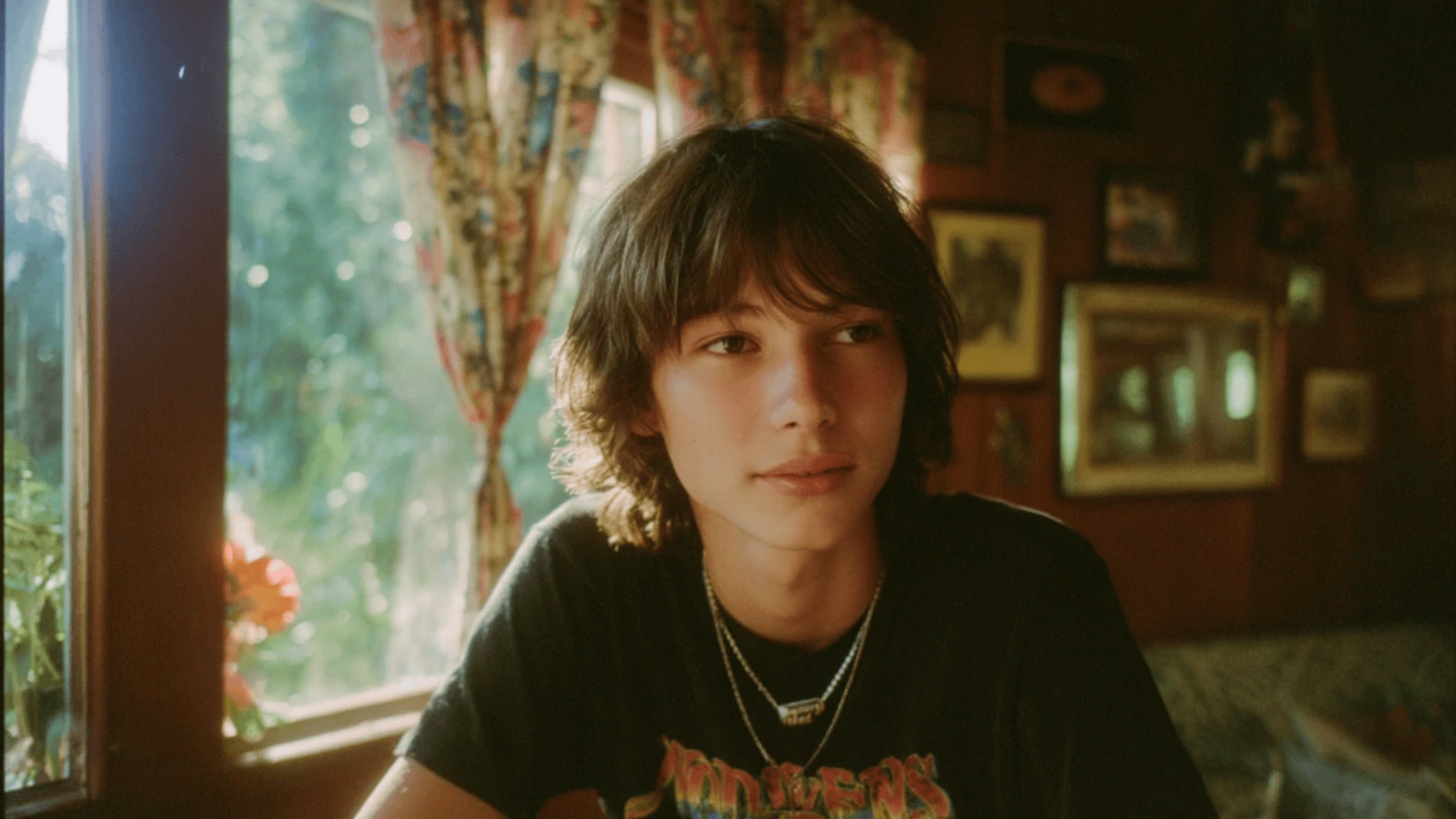 Relaxed curtain bangs hairstyle for trendy teenage boys