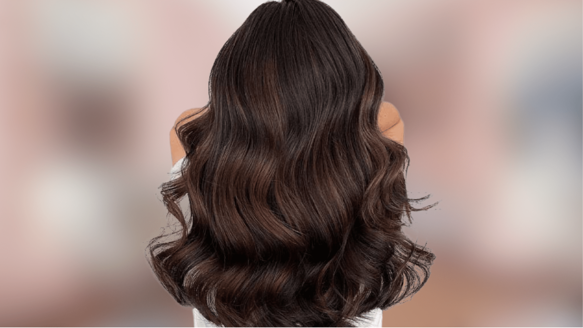 Shoulder length waves featuring deep chocolate brown hair color with rich warm tones