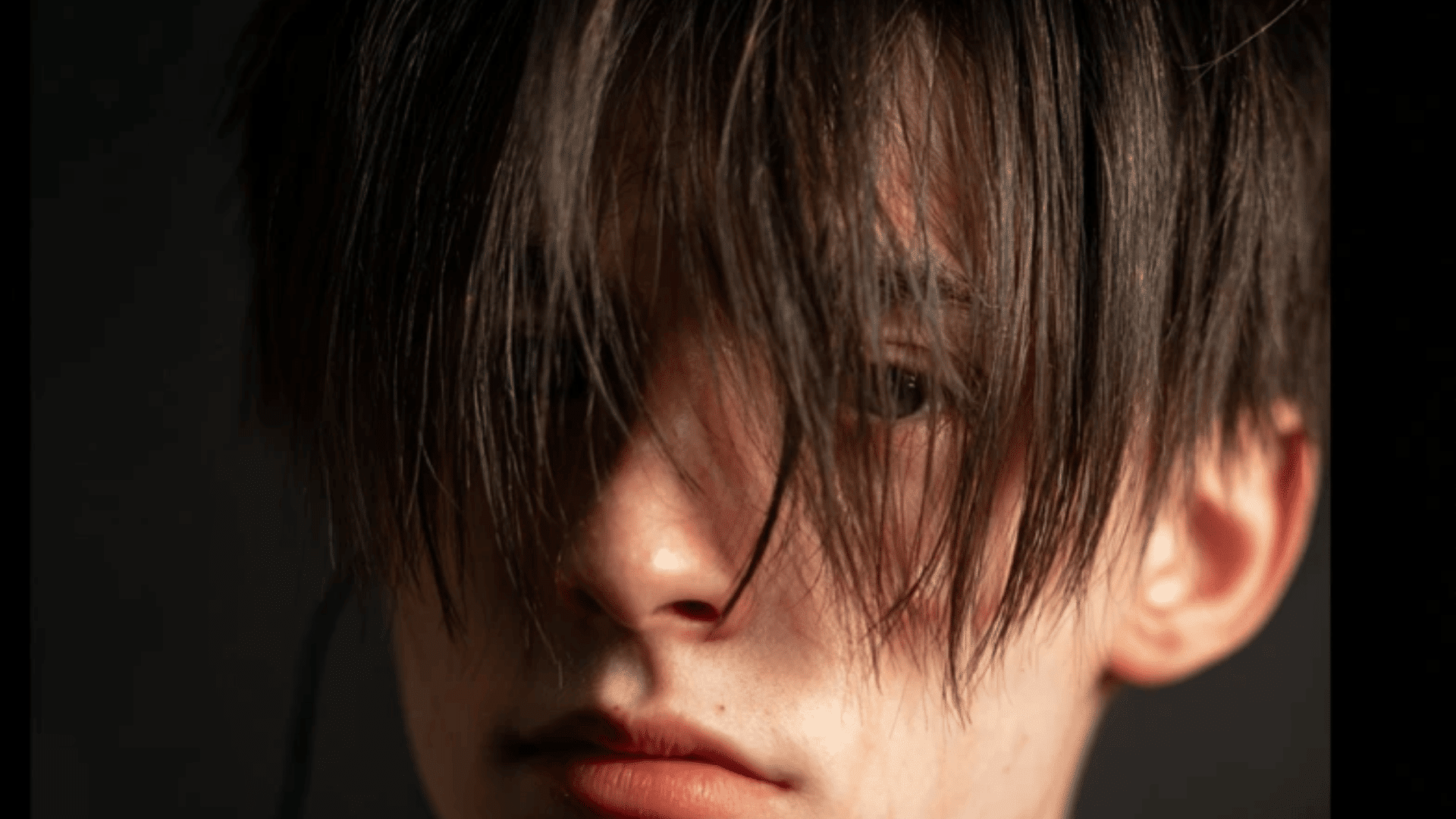 E-boy fringe haircut with alternative trendy styling
