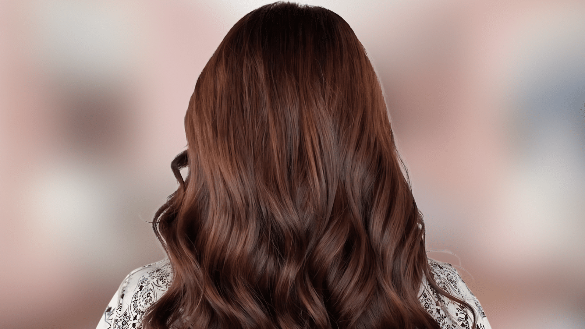 Soft waves featuring espresso brown hair color with sleek cool undertones