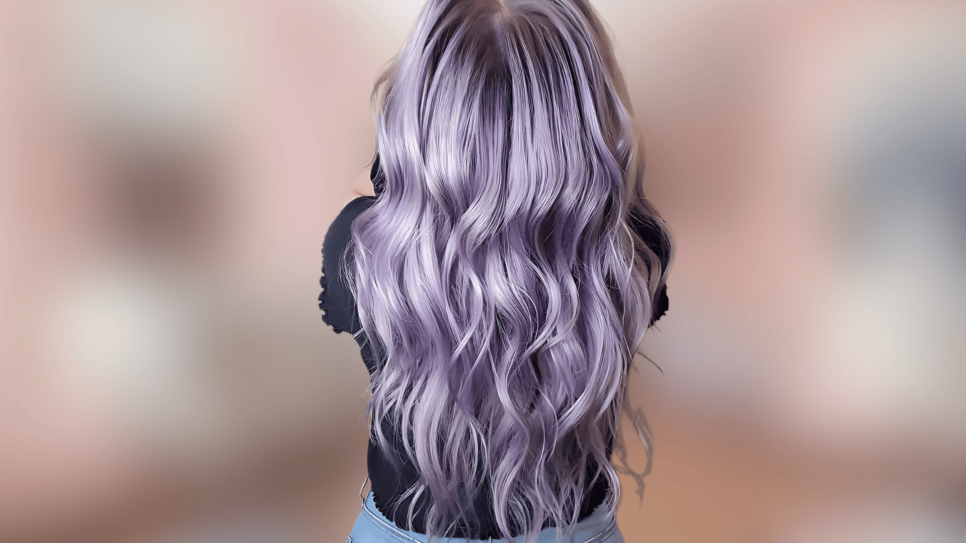 Shoulder length waves displaying frosted lavender hair with cool pastel tones