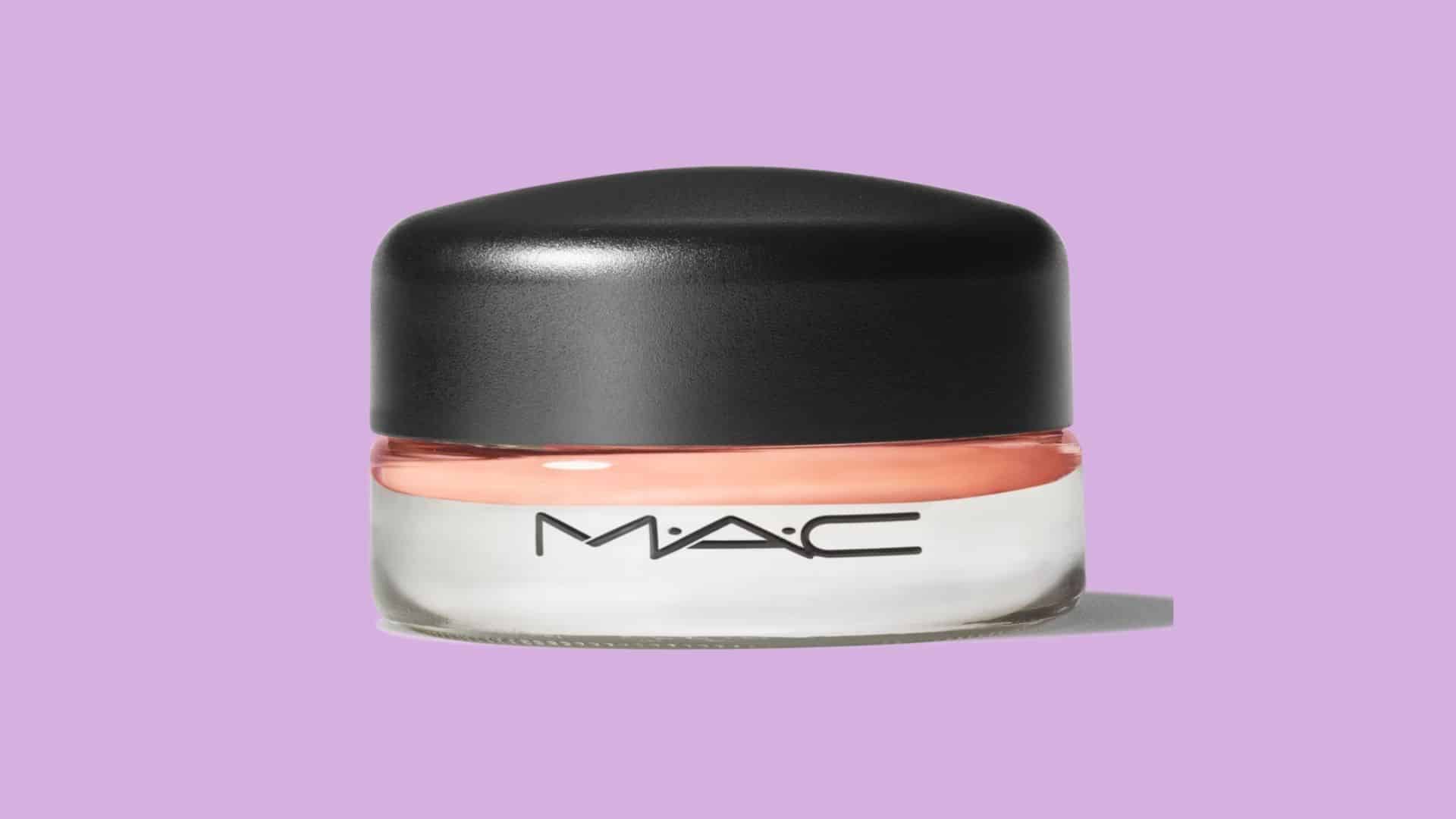 MAC Pro Longwear Paint Pot cream eyeshadow primer in a glass pot on a purple background
