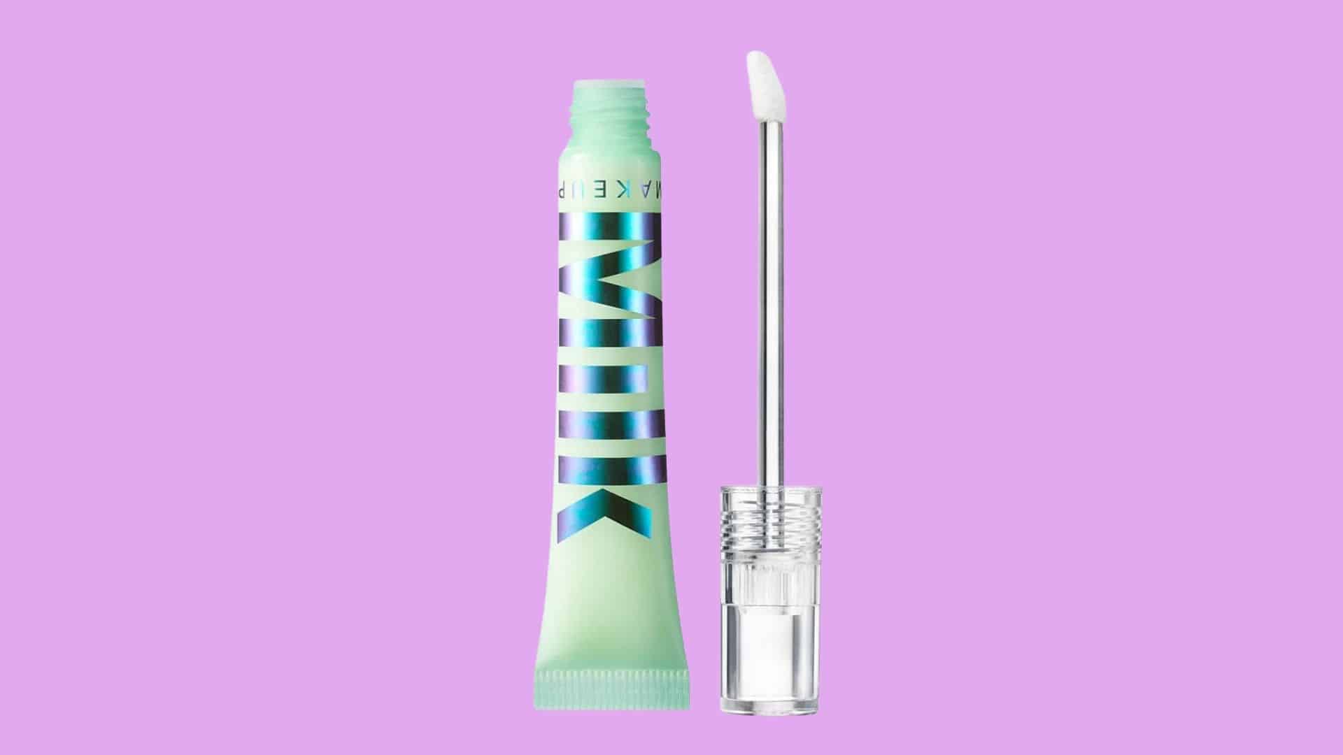 Milk Makeup Hydro Grip Eye Primer tube with applicator displayed on a colorful background