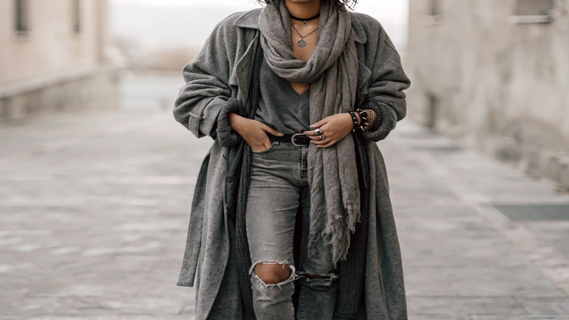 punk winter outfit with oversized coat scarf jeans and boots