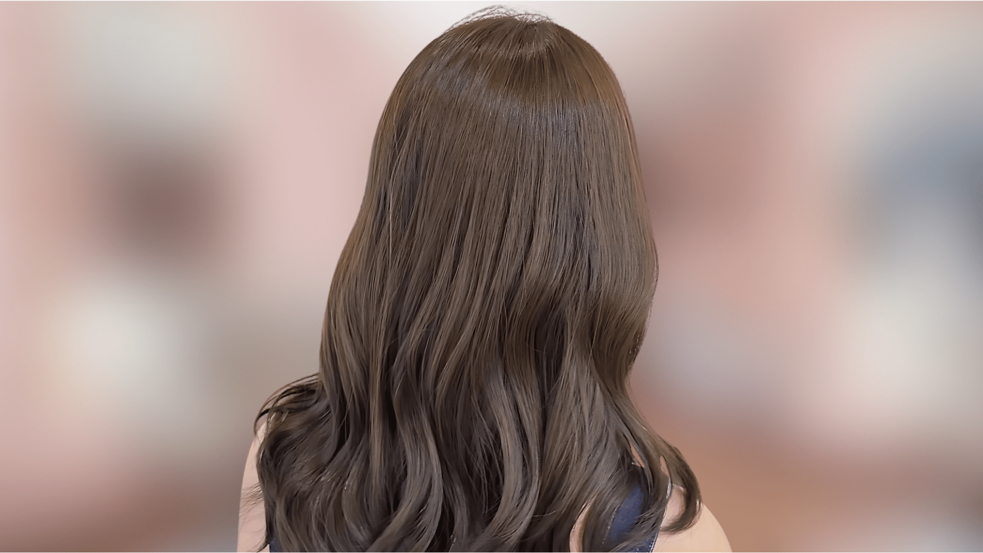 Soft waves featuring sable brown hair color with deep natural red undertones