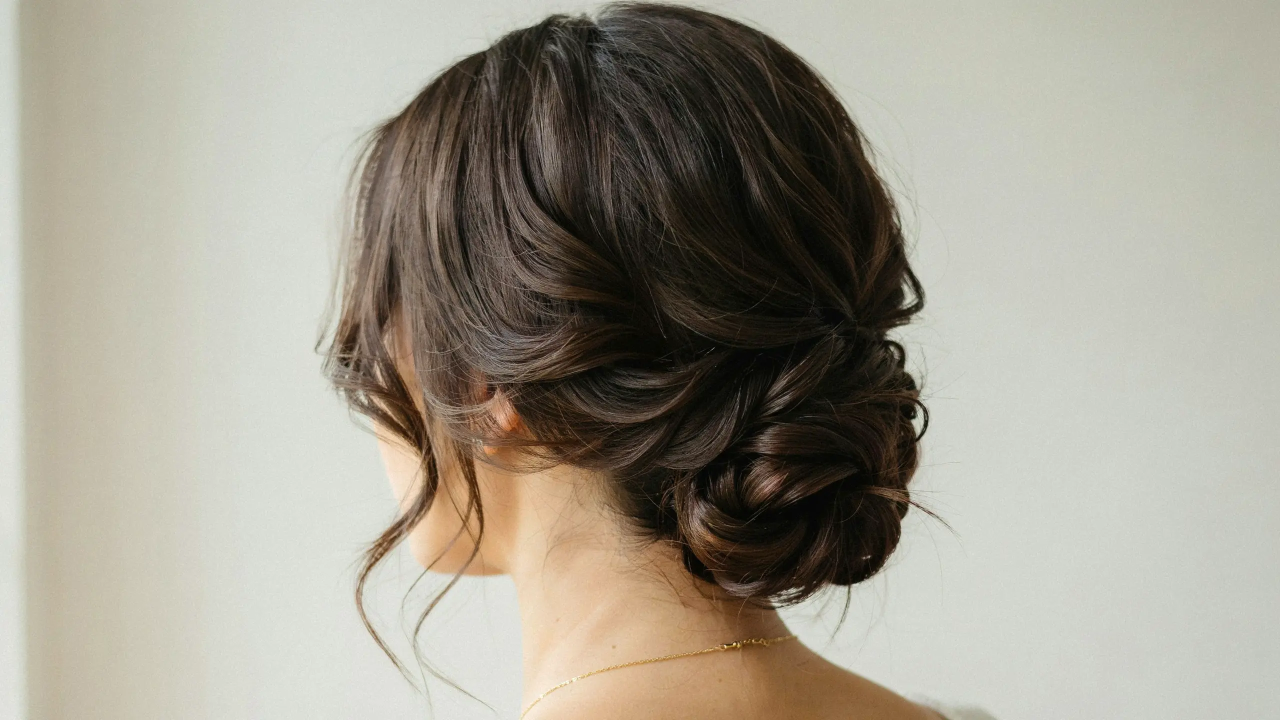 Side swept low bun, one of many romantic updo hairstyles
