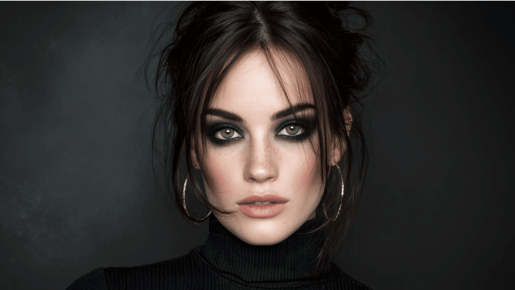 Smokey eye makeup featuring dark blended shadows, dramatic lashes, and a sultry evening look
