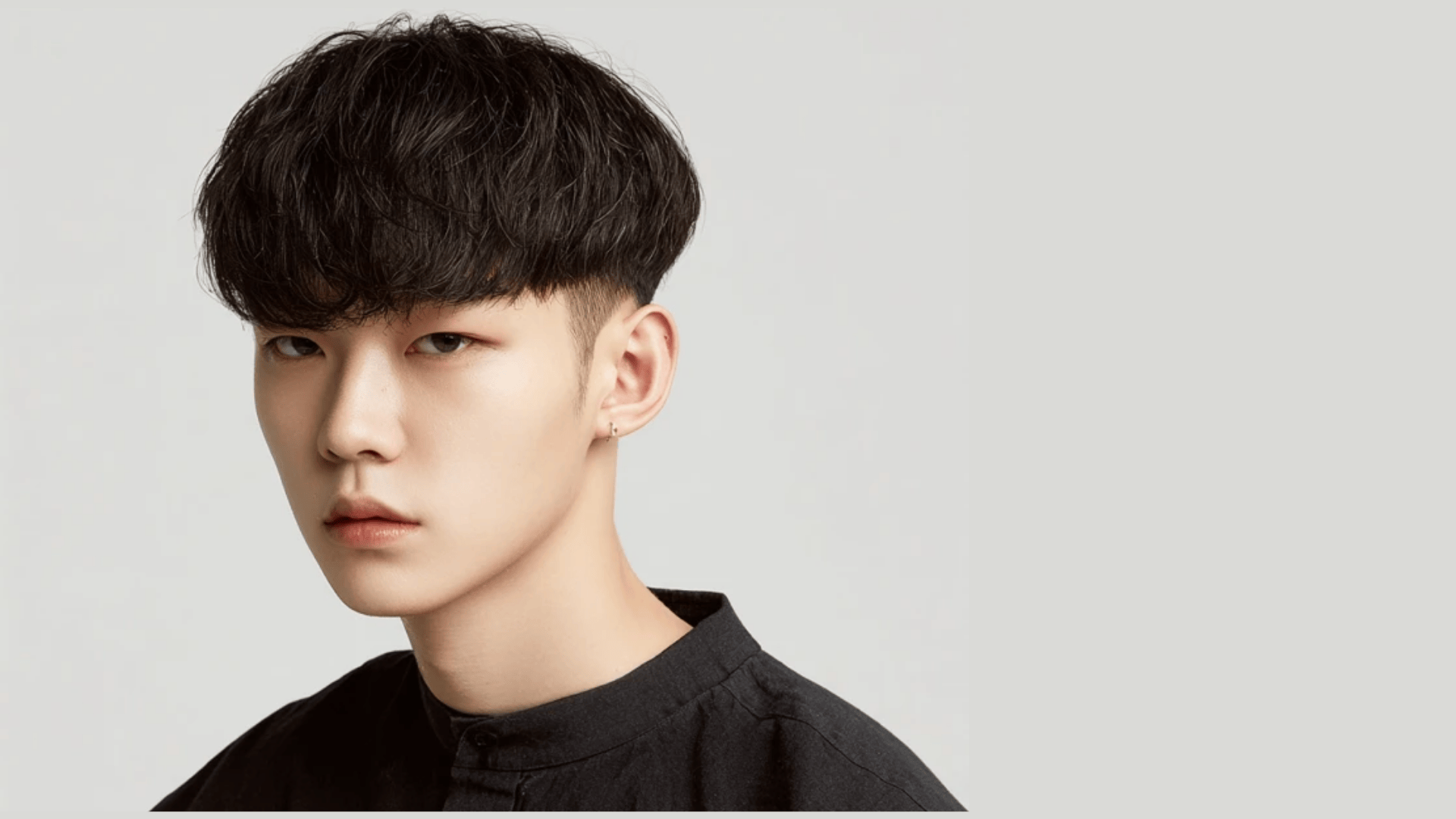 Two block haircut with Korean-inspired styling trends