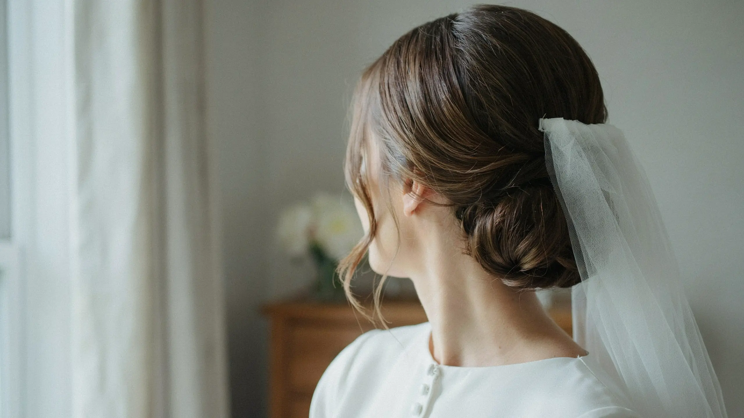 Veil friendly updo hairstyles with a soft low bun
