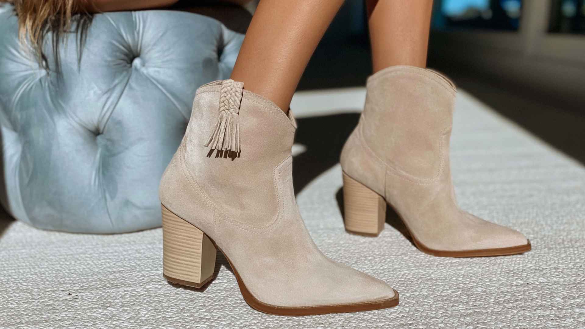 Beige western booties with short shafts block heels and pointed toes for casual fashion outfits
