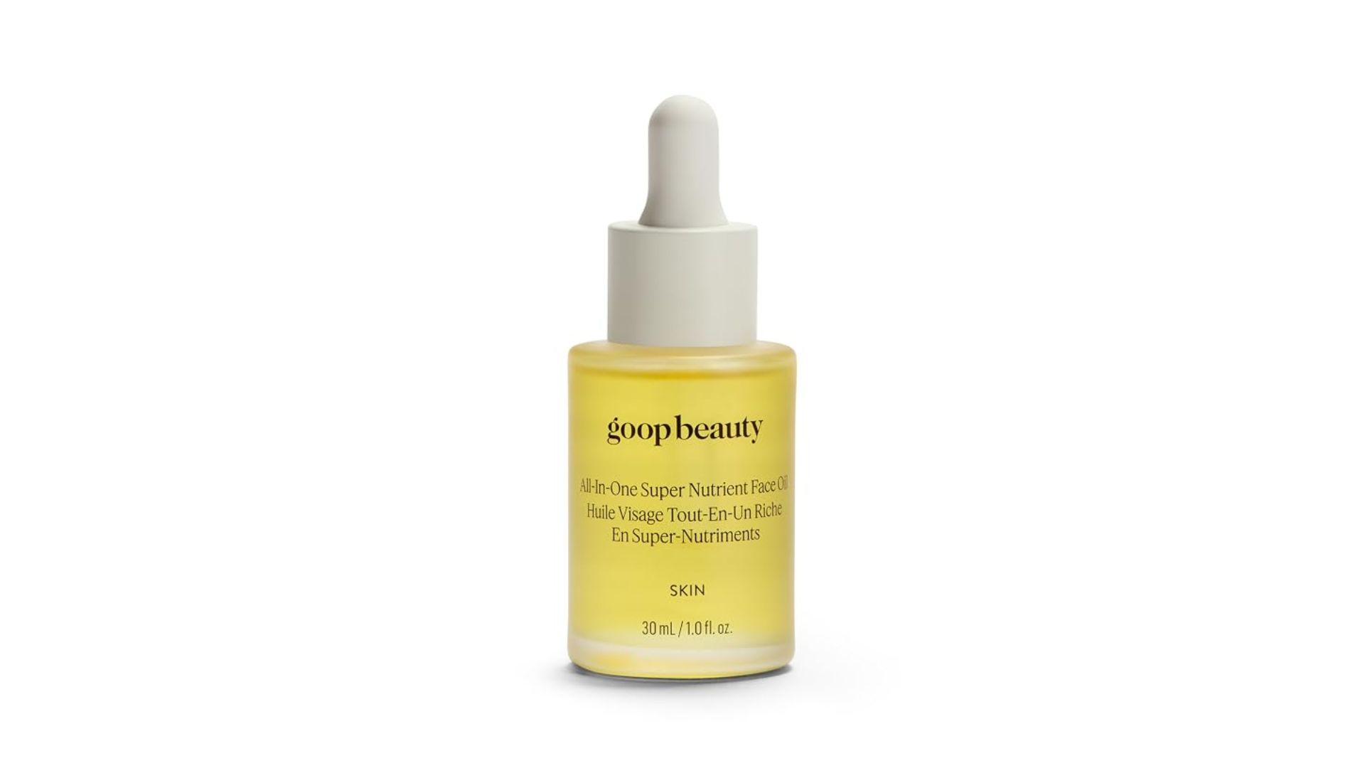 Goop Beauty All In One Super Nutrient Face Oil in a frosted yellow glass bottle with cream dropper on white background
