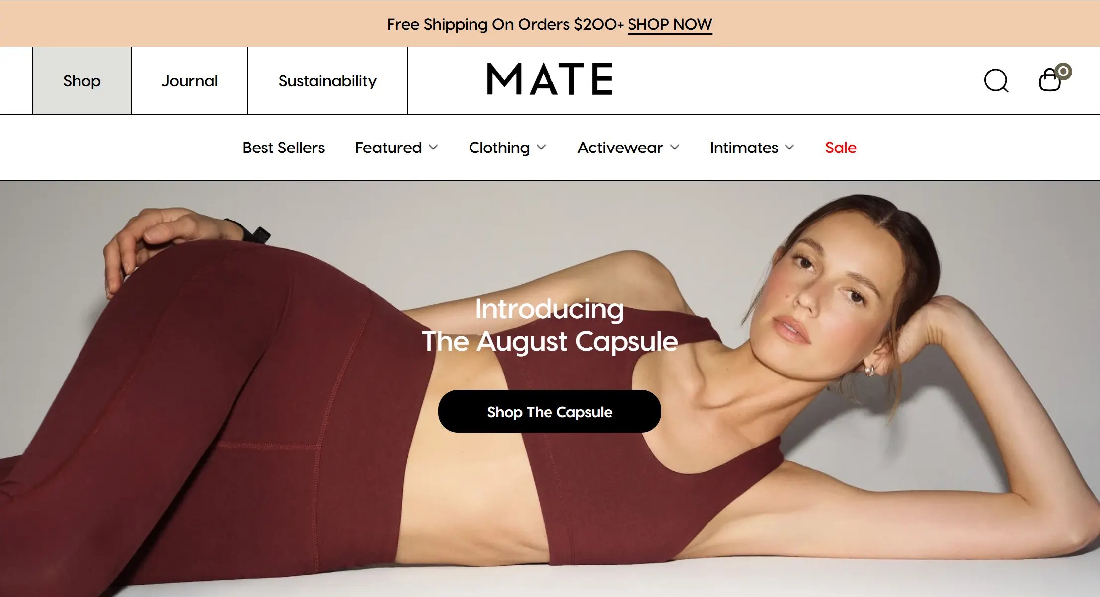 MATE homepage banner featuring a model in maroon activewear for