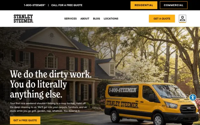 Yellow Stanley Steemer van parked in front of large brick house in sunny suburban neighborhood