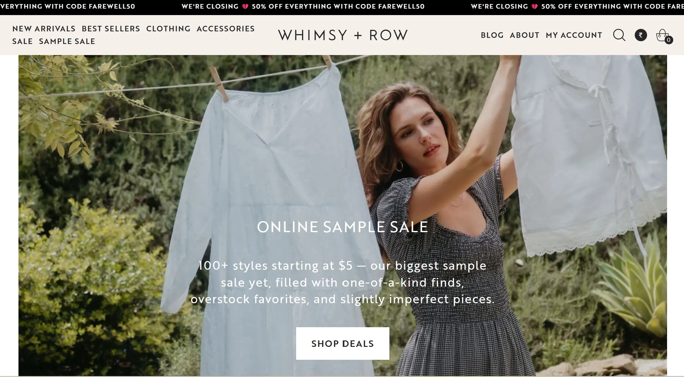 Woman hanging white clothes on a clothesline outdoors with