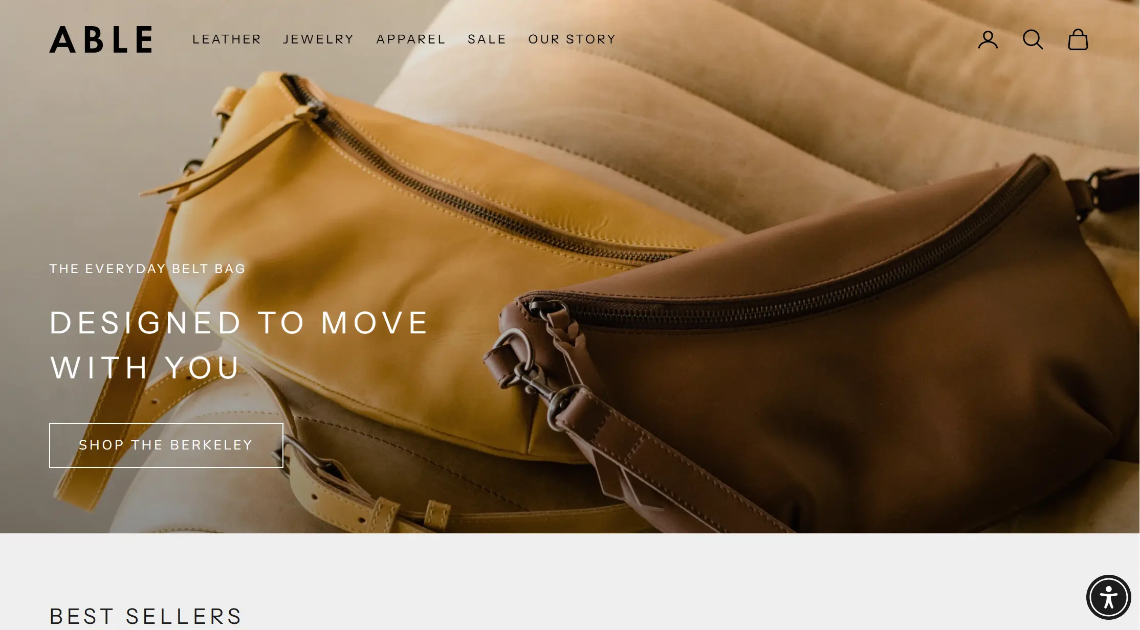 Yellow and brown leather belt bags with text
