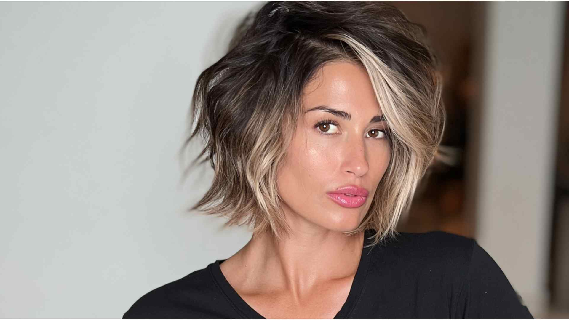 Asymmetrical bob with one shaved side and a longer opposite section