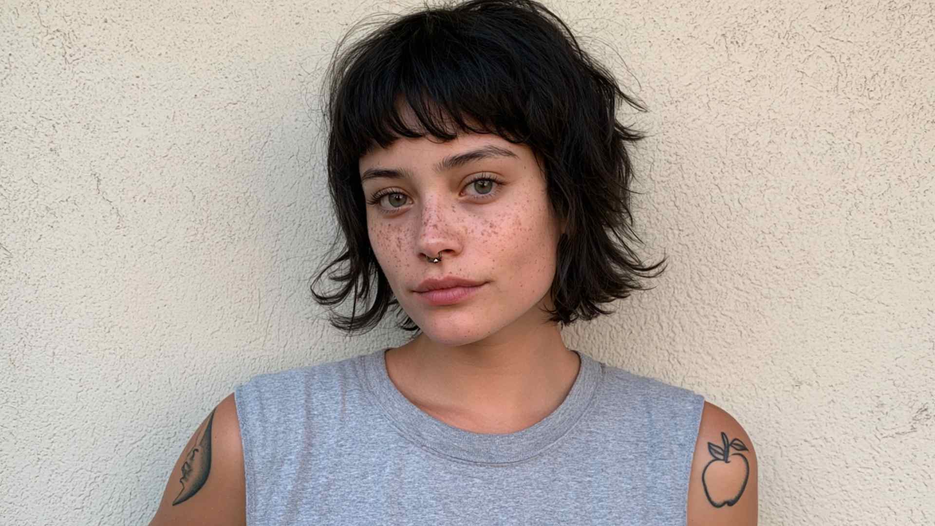 Long grunge hair with wispy choppy bangs and separated ends