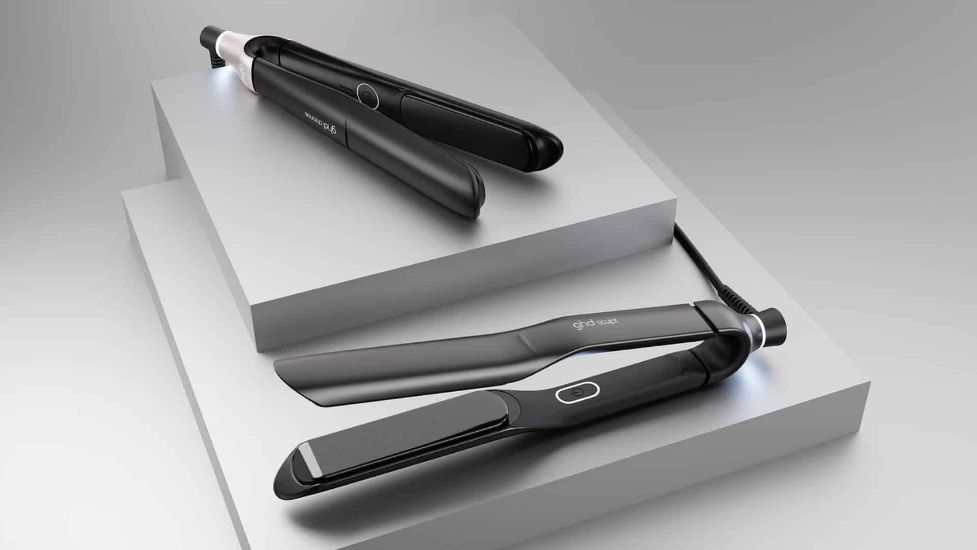 GHD Platinum Plus hair straightener with premium packaging displayed on a modern vanity surface