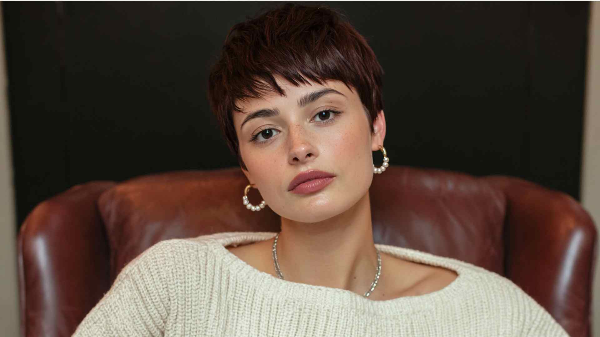 Short grunge pixie cut with longer choppy pieces on top