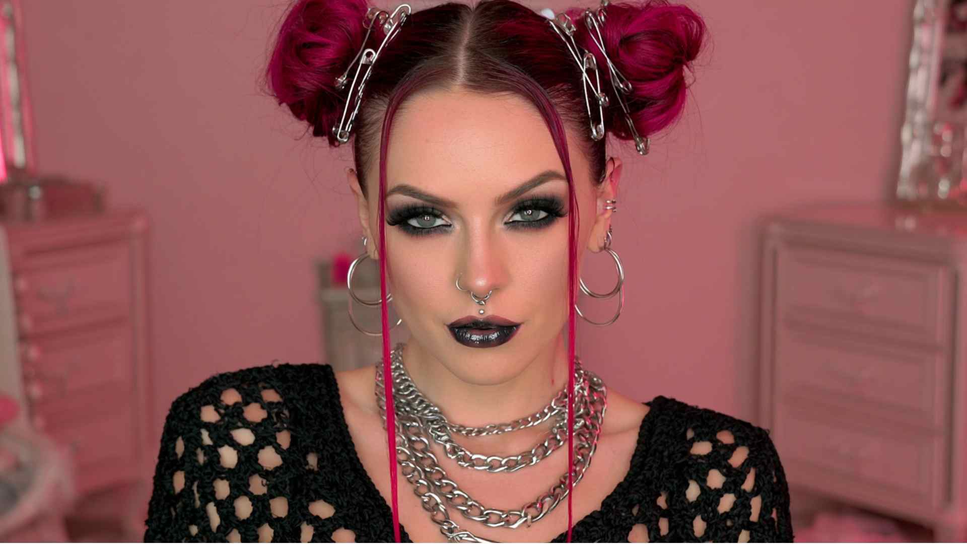 90s inspired grunge space buns with loose face framing strands
