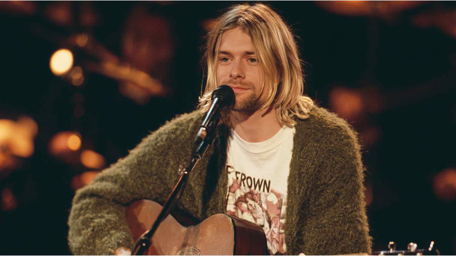 Long grunge hair with a center part and loose, grown out layers