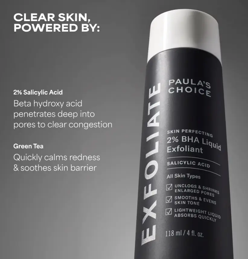 Bottle of exfoliant with salicylic acid on gray background, featuring product details and benefits