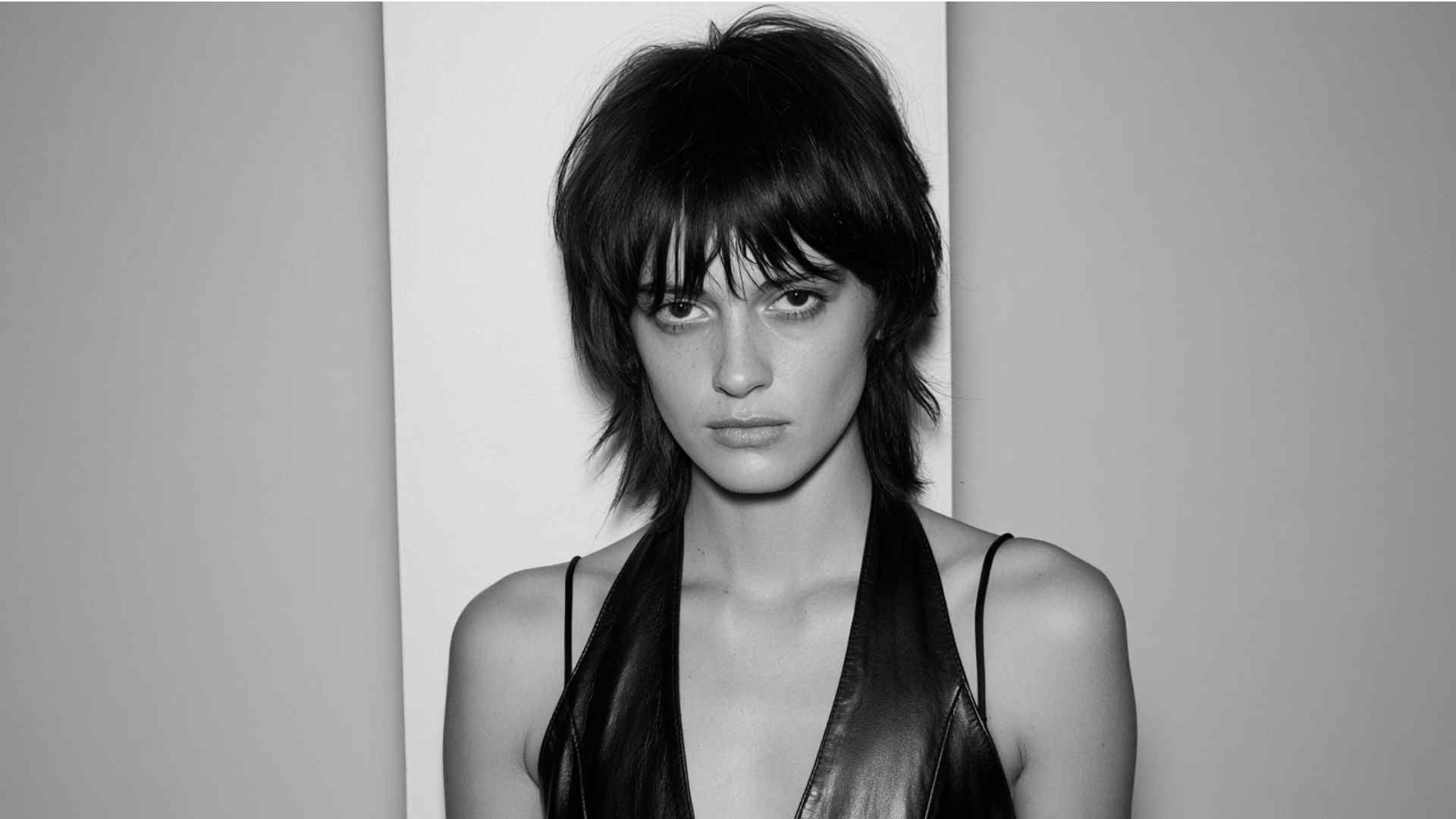 Soft shag mullet with layered crown and longer feathered back