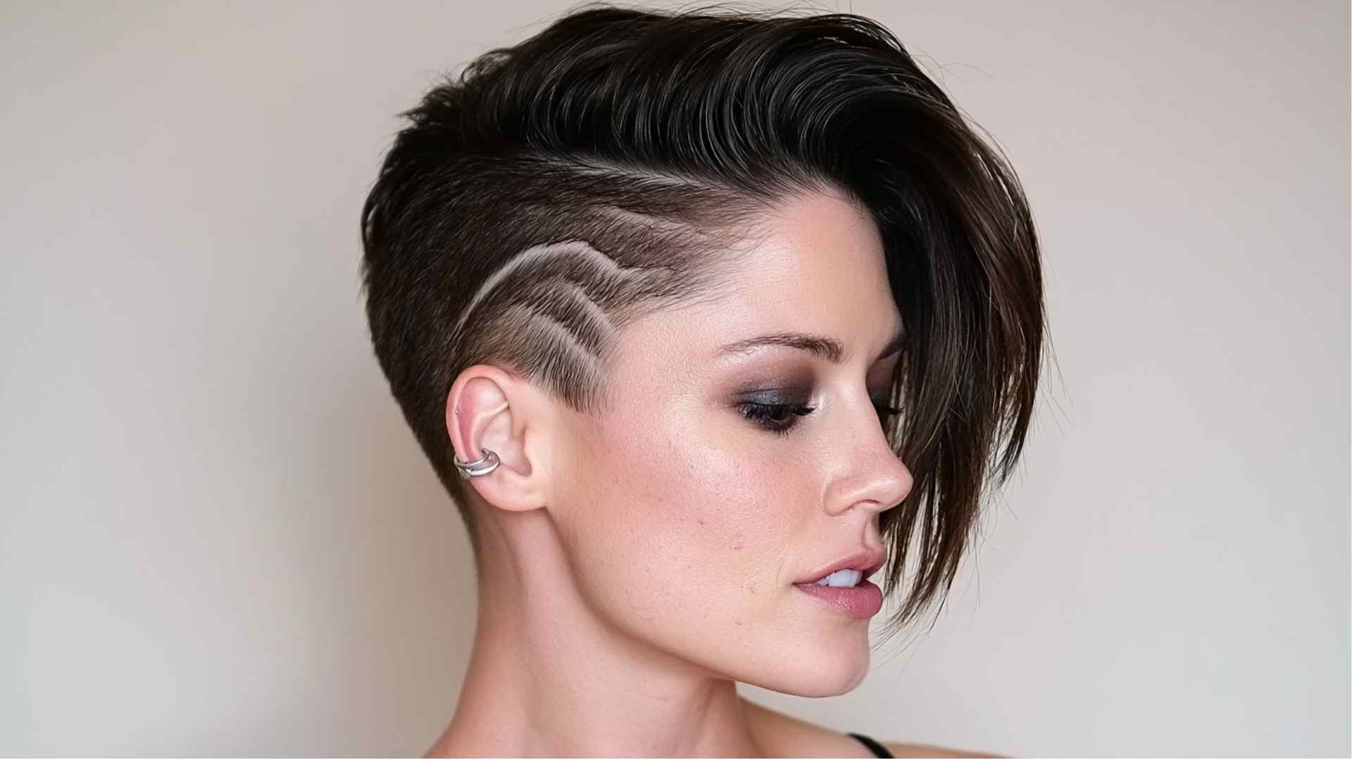 Textured pixie with one closely shaved side and a longer top