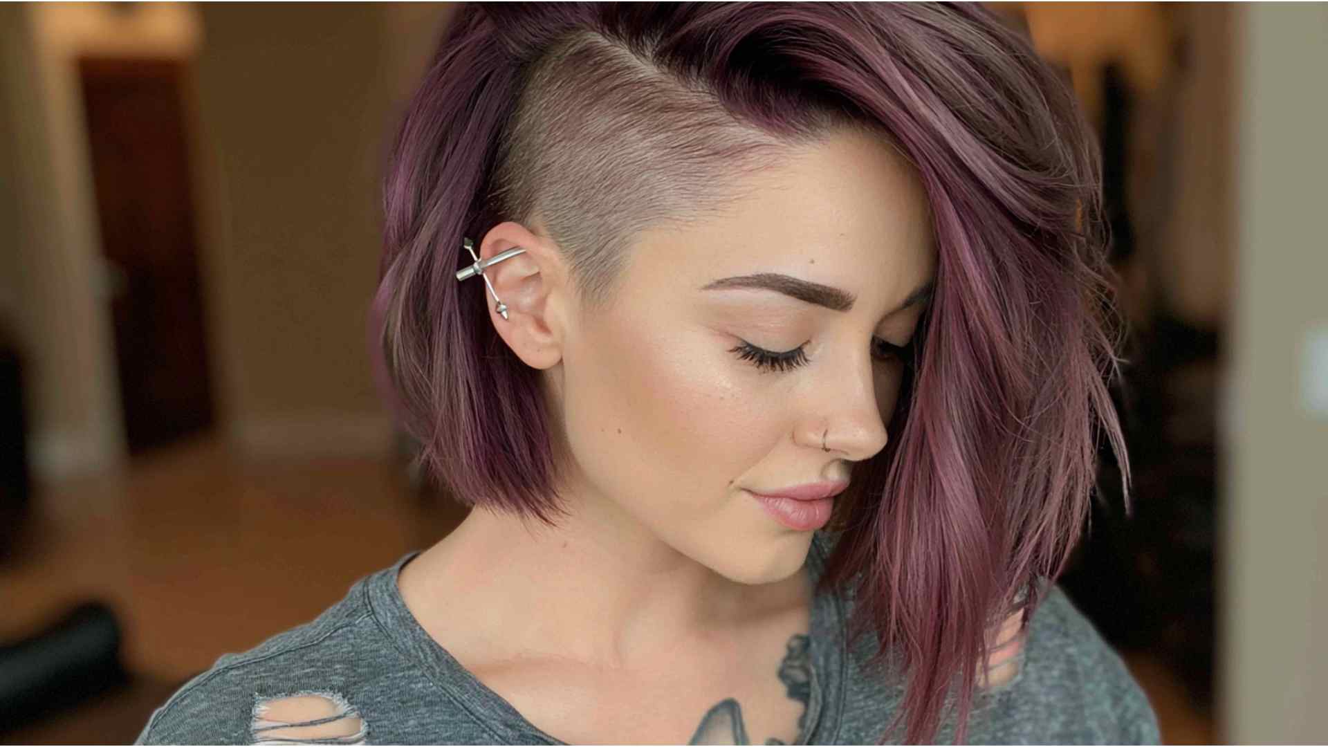 Short bob with a concealed undercut beneath the top layer