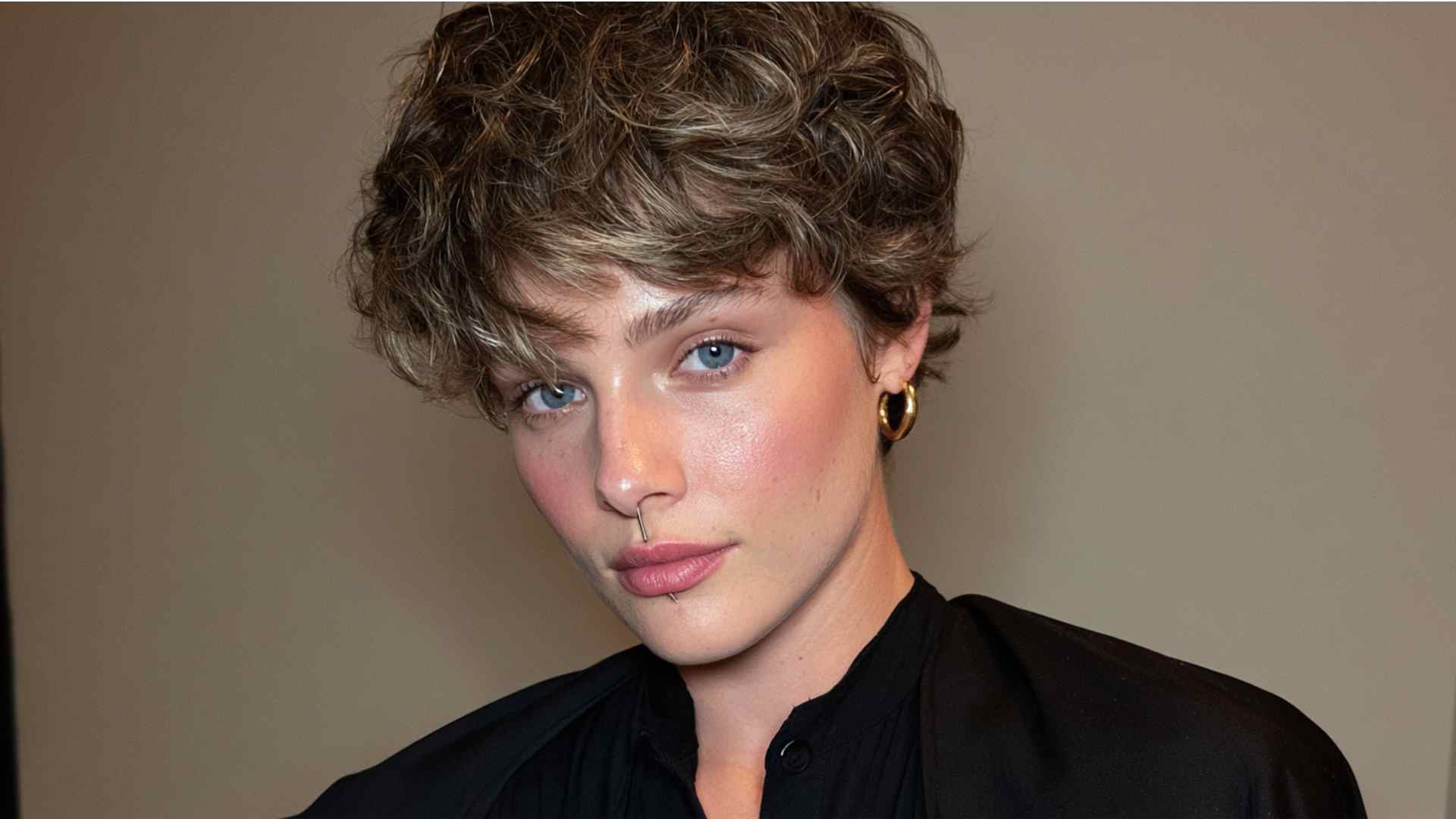 Short textured crop with compact sides and long piecey bangs